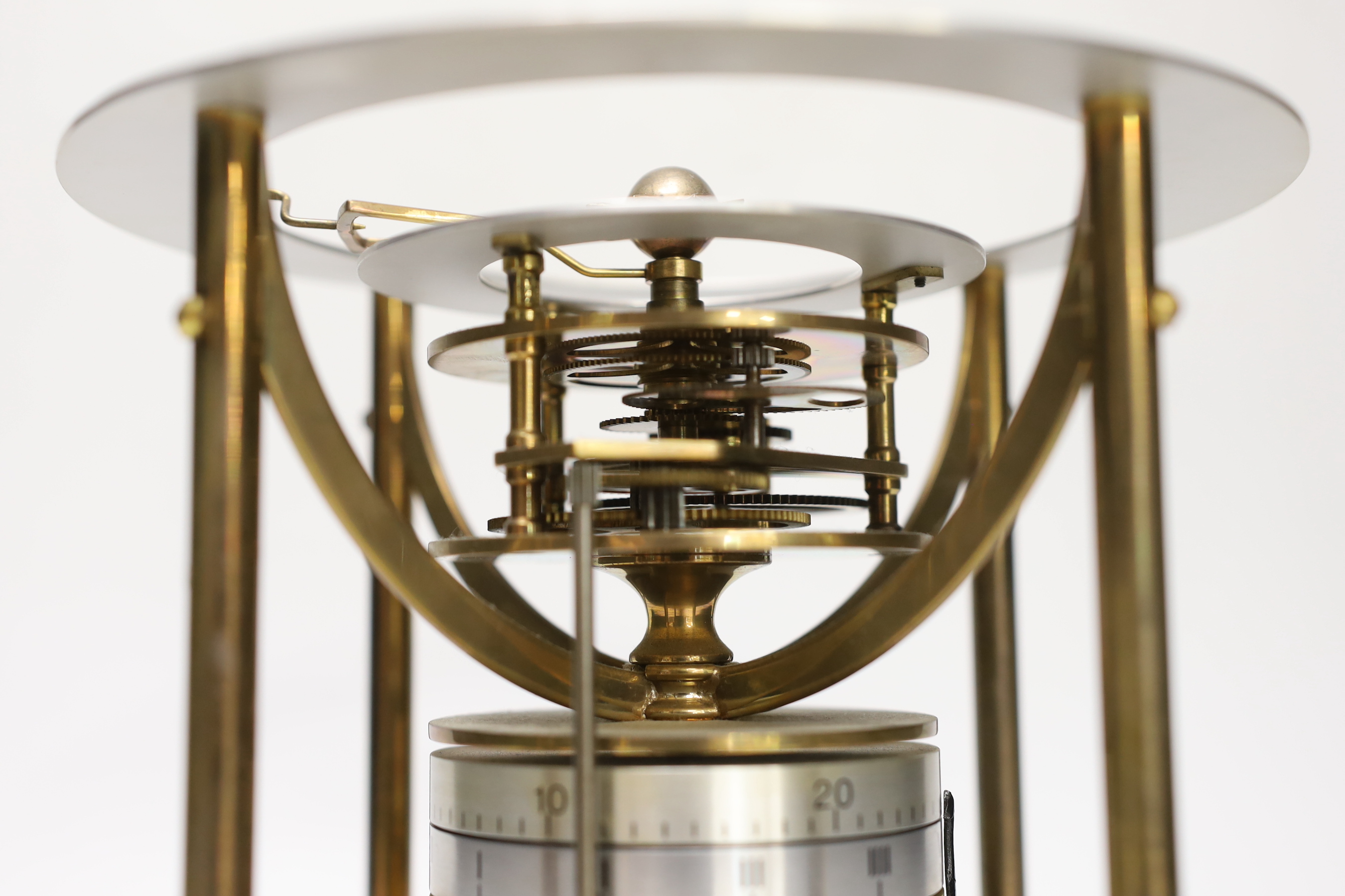 A circular novelty calendar timepiece, 20cm high